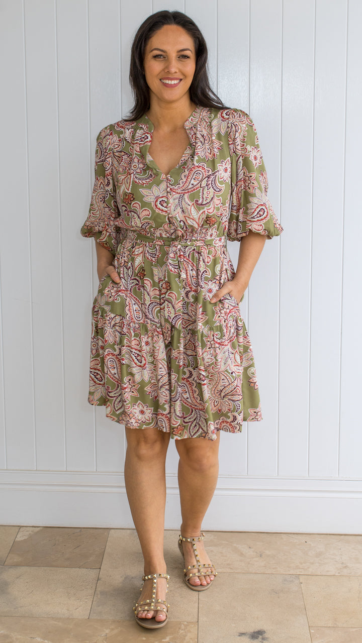 Shabby Sisters | New Arrivals | Green Print Dress | V Neckline | Covered Button Close at Front | Statement Balloon Sleeves | Elastic Sleeve Cuff | Elastic Waist | Removable Fabric Tie Belt | Tiered Skirt | Pockets | Knee Length | Sizes Available 6 to 14